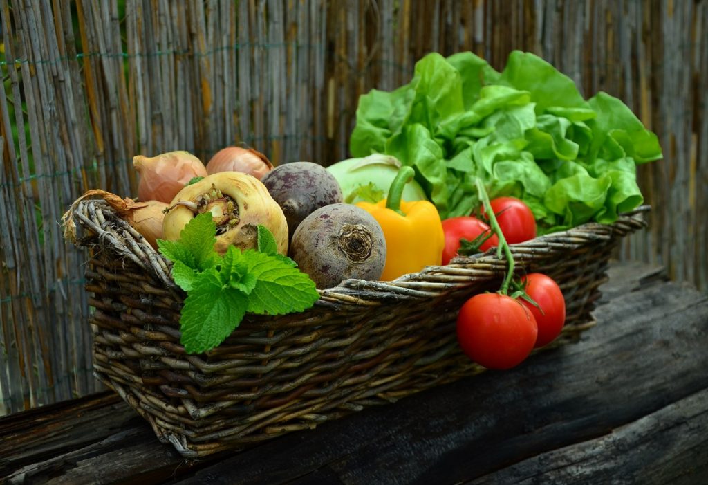 Brown basket of vegetables