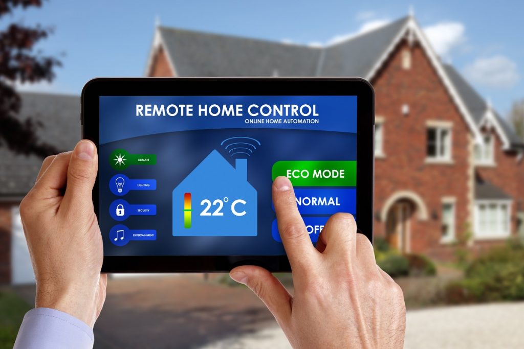 Man holding a remote home control