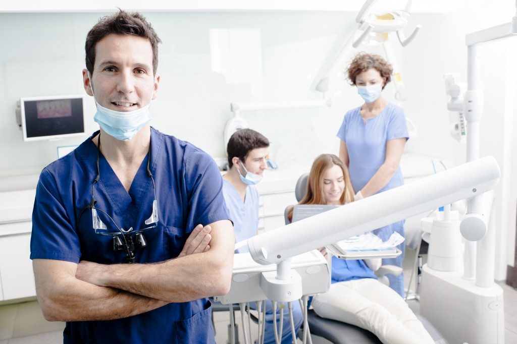 a team of dentists working