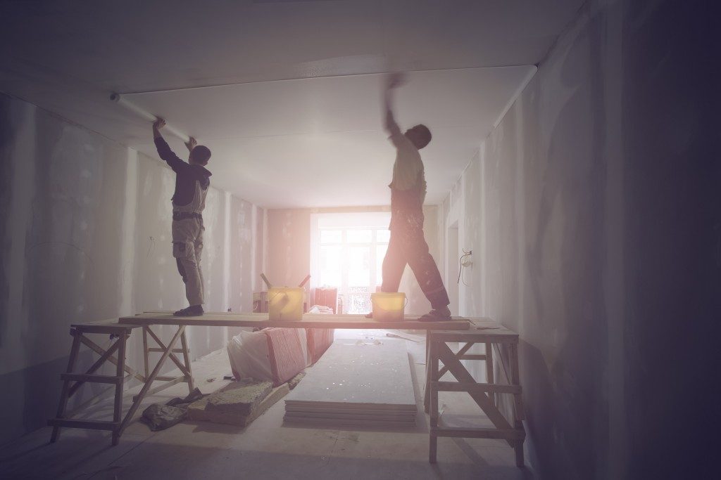 Workers remodeling an apartment