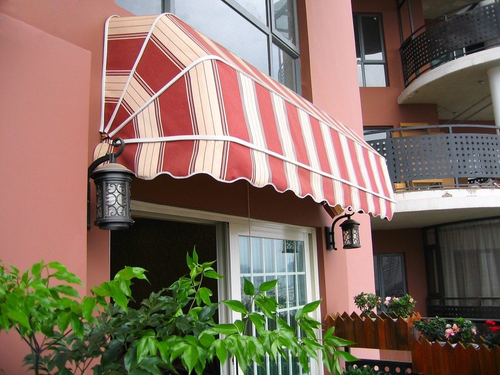 Patio with an awning above the door