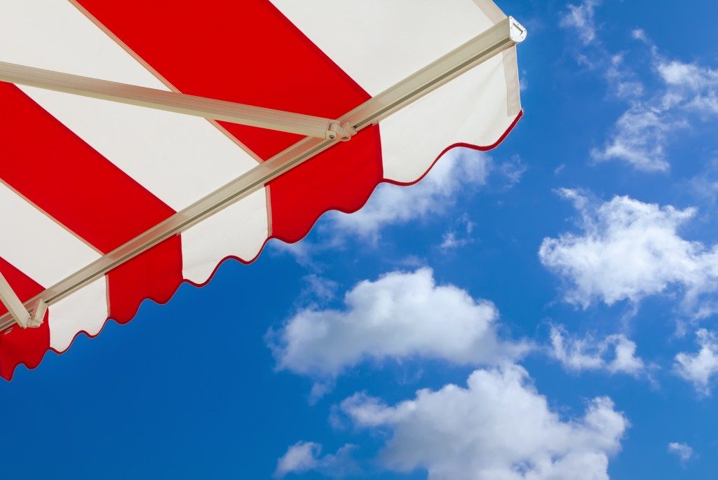 Awning over bright sunny blue sky