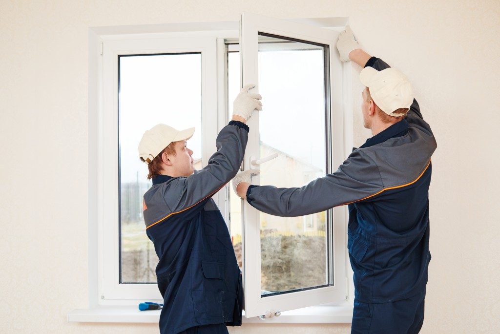 men installing windows