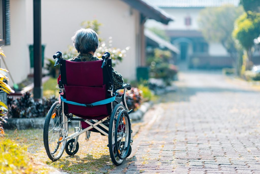 old woman on a wheelchair