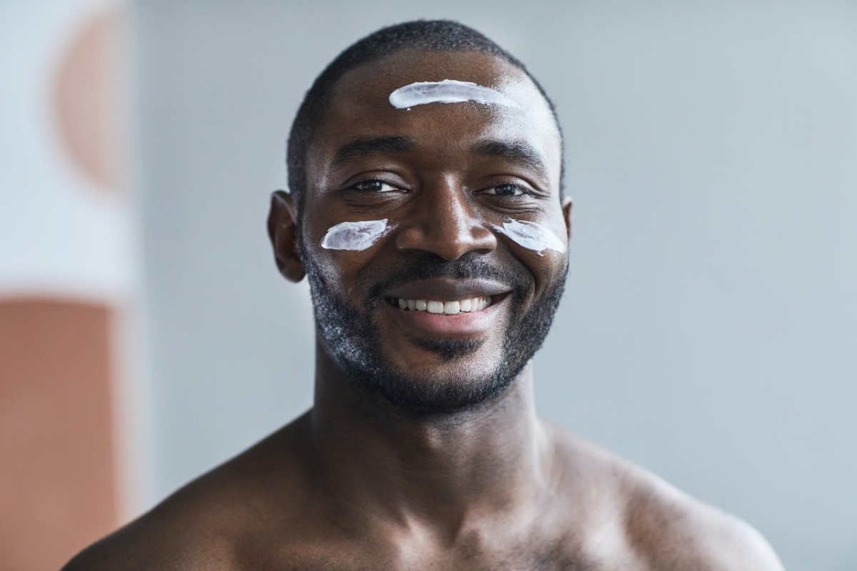man using facial products