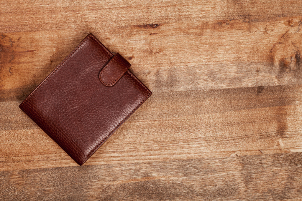 wallet on wooden floor