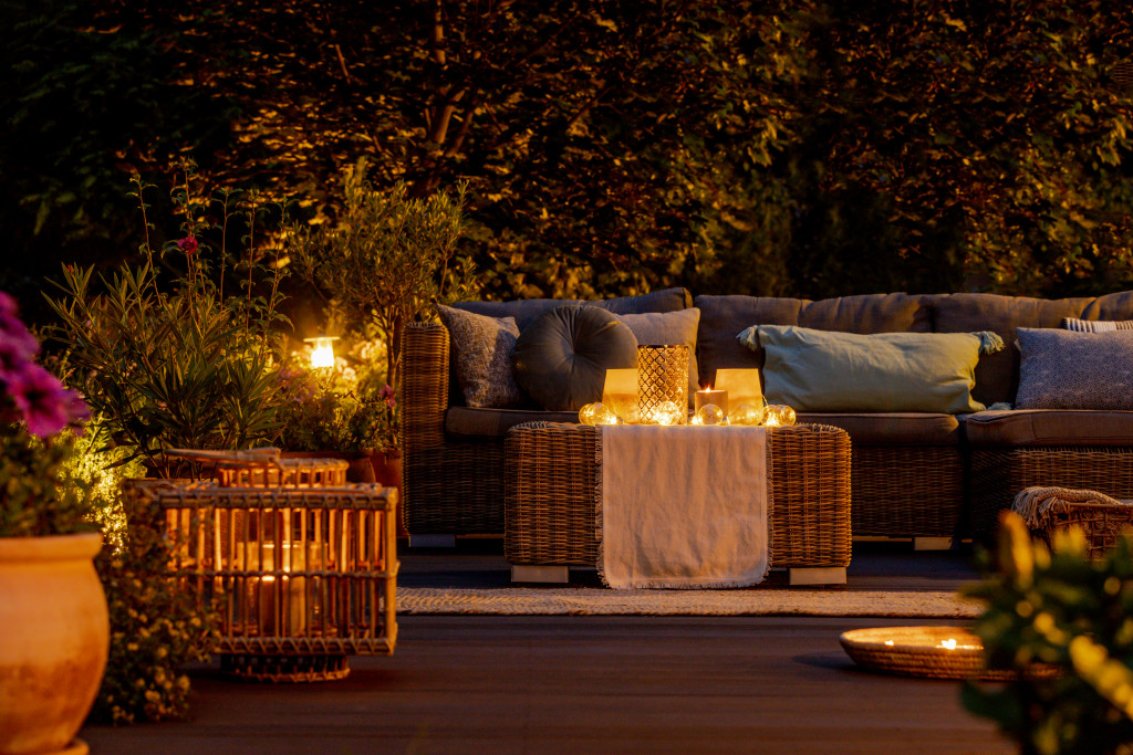 patio with furniture and candles