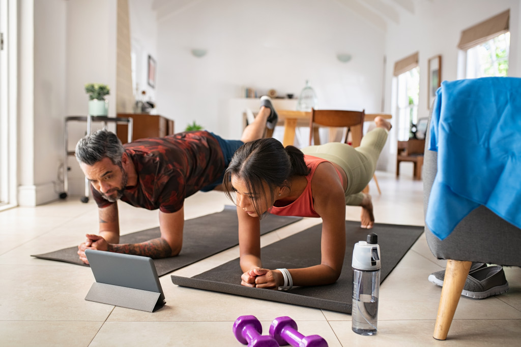 couple exercising at home